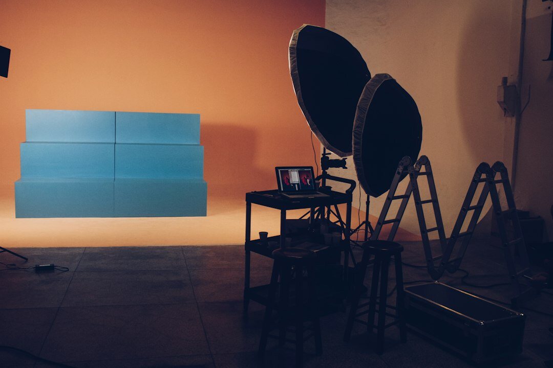 TV studio control room with monitors and broadcast switcher during live transmission